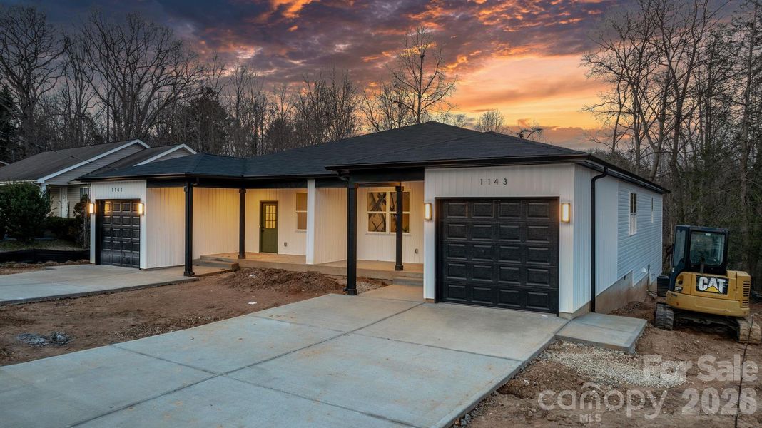 Front exterior of a new home in , Hickory, NC, highlighting curb appeal (Image 4).