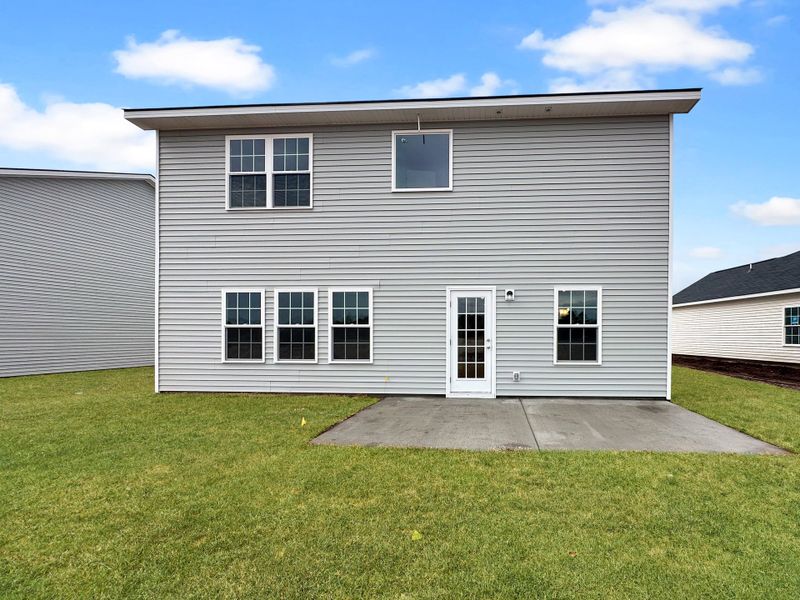 Exterior details and patio area of a home in Grand Reserve, Hinesville (Image 2).