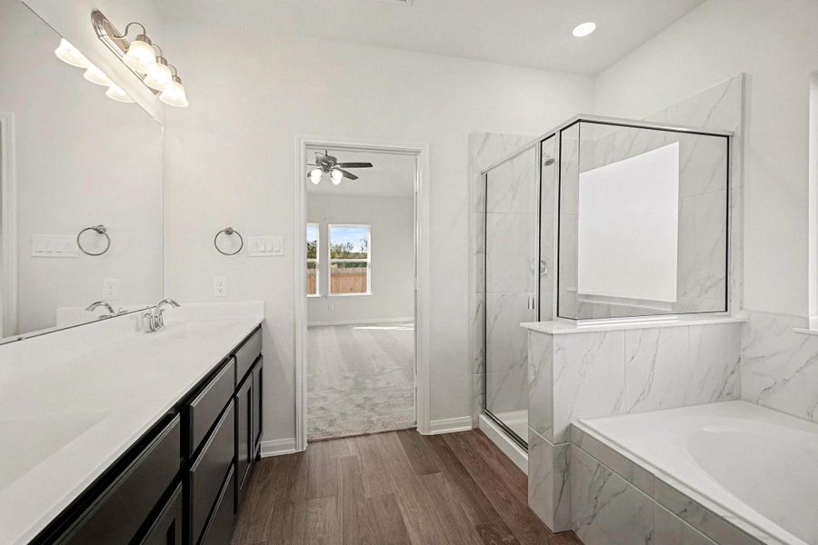 Furnished interior view inside a new home in Clear View Estates, Willis (Image 9).