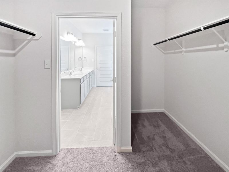 The Princeton II- Walk-in Closet in Primary Bedroom. Home under construction, image used for illustrative purposes only, colors and options will vary. The Princeton II- Walk-in Closet in Primary Bedroom. Home under construction, image used for illustrative purposes only, colors and options will vary.