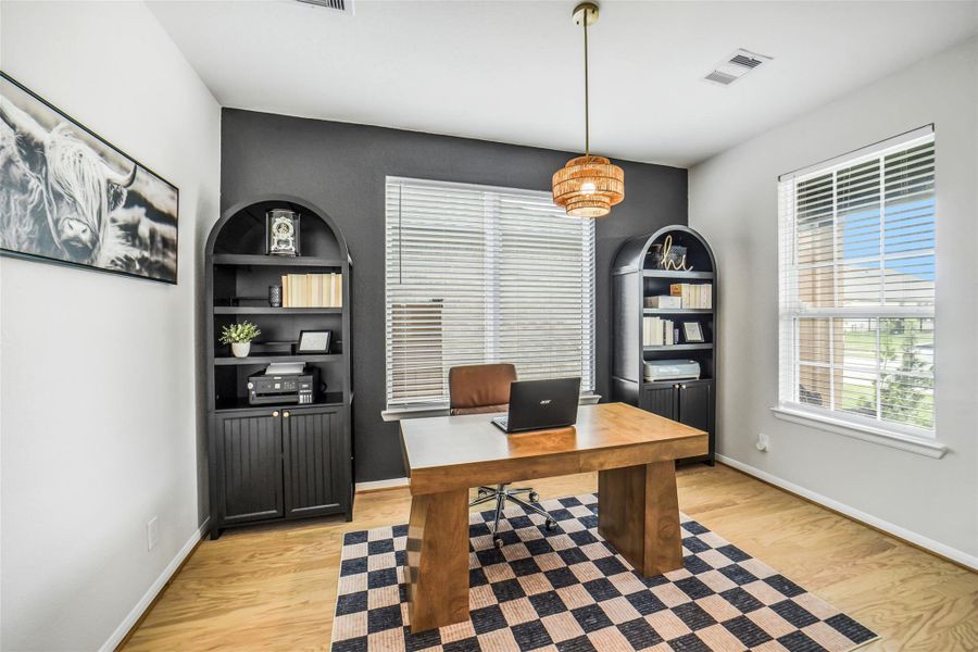 An elegant modern private office with french doors