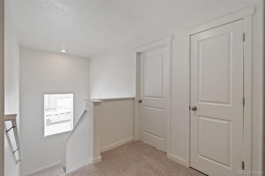 Spacious, unfurnished interior of a new home in Trails at Crowfoot, Parker (Image 24).