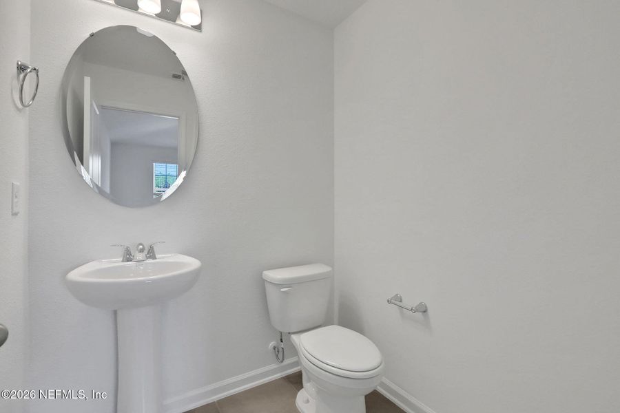 Furnished interior view inside a new home in Amberly, Green Cove Springs (Image 11).