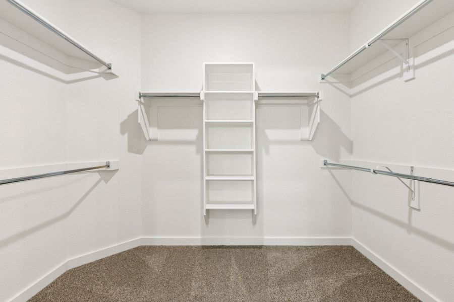Primary Closet in the Emmy II home plan by Trophy Signature Homes - REPRESENTATIVE PHOTO Primary Closet in the Emmy II home plan by Trophy Signature Homes - REPRESENTATIVE PHOTO