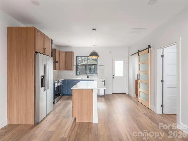 Furnished interior view inside a new home in , Waynesville (Image 3).