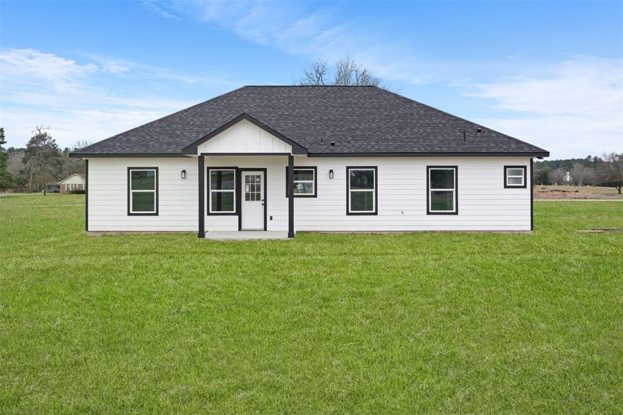 Exterior details and patio area of a home in , Trinity (Image 2). Exterior details and patio area of a home in , Trinity (Image 2).