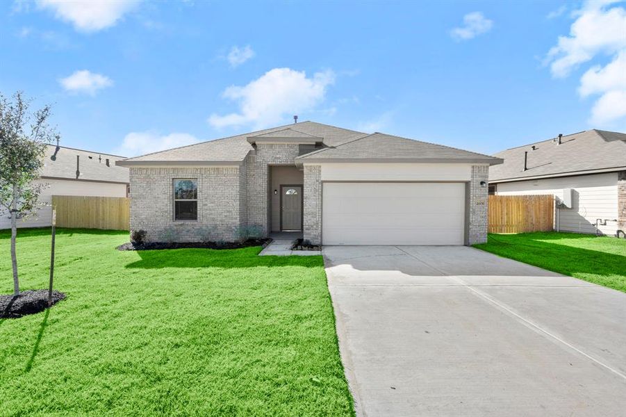 Front exterior of a home in the Grand Oaks Reserve community, located in Cleveland, TX (Image 4).