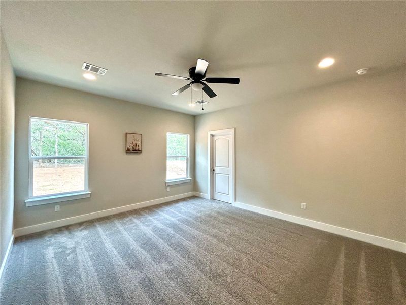 Primary bedroom. Primary bedroom.