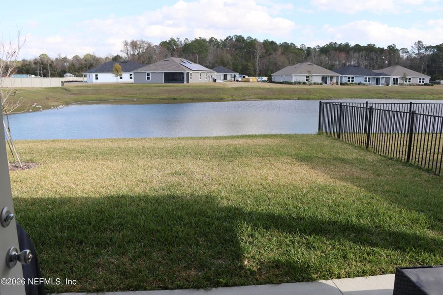 Exterior details and patio area of a home in Hawkes Meadow, Jacksonville (Image 21).