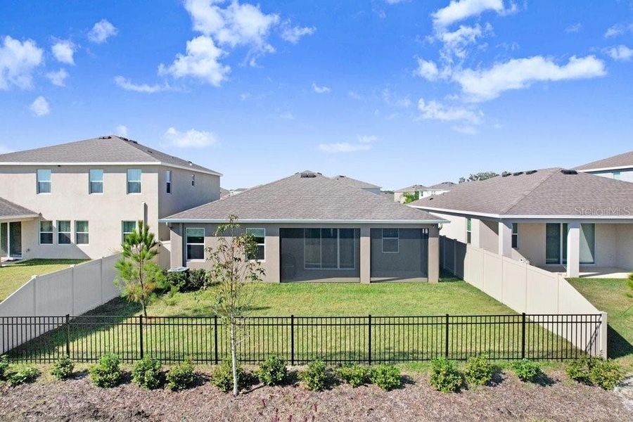 Front exterior of a new home in Westgate at Avalon Park, Wesley Chapel, FL, highlighting curb appeal (Image 24).