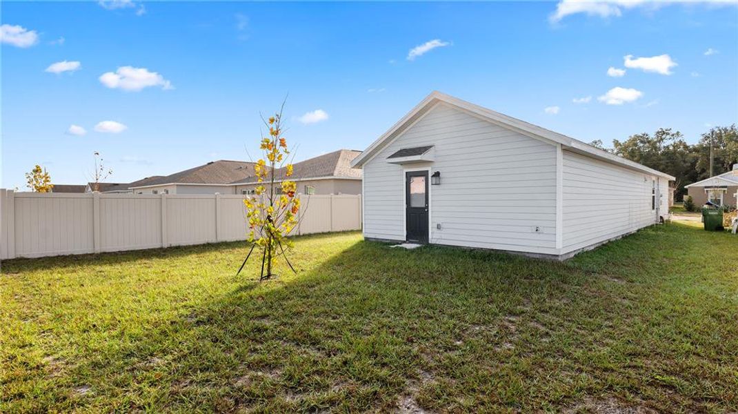 Exterior details and patio area of a home in Peace Creek Reserve: Legacy Collection, Winter Haven (Image 28).