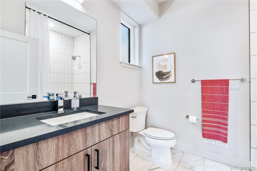 Furnished interior in a model home at Townhomes on Harlan St. in Westminster (Image 9).