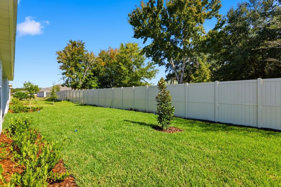 Exterior details and patio area of a home in Headwaters at Lofton Creek, Yulee (Image 20).