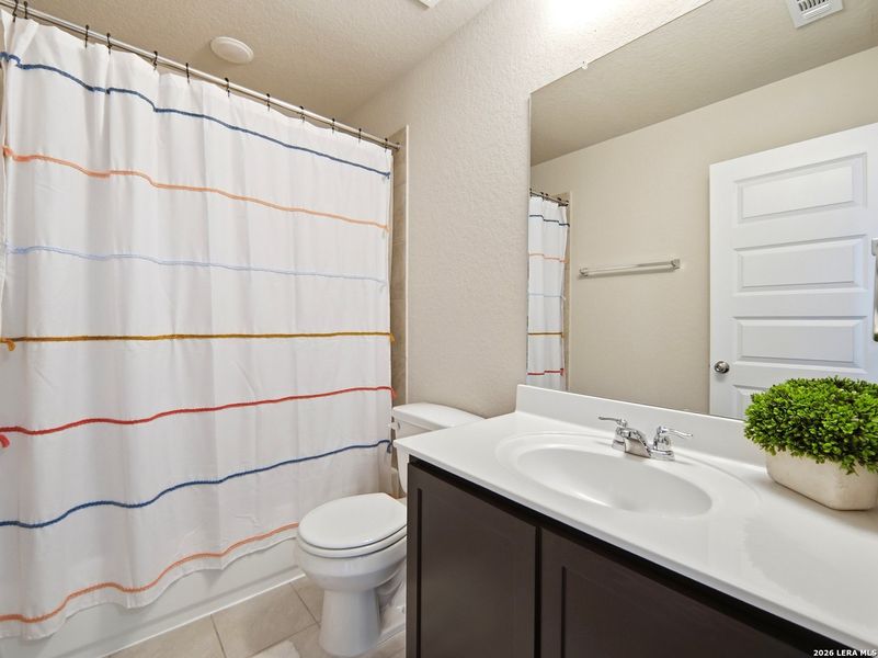 Furnished interior view inside a new home in Ventana, Bulverde (Image 42).