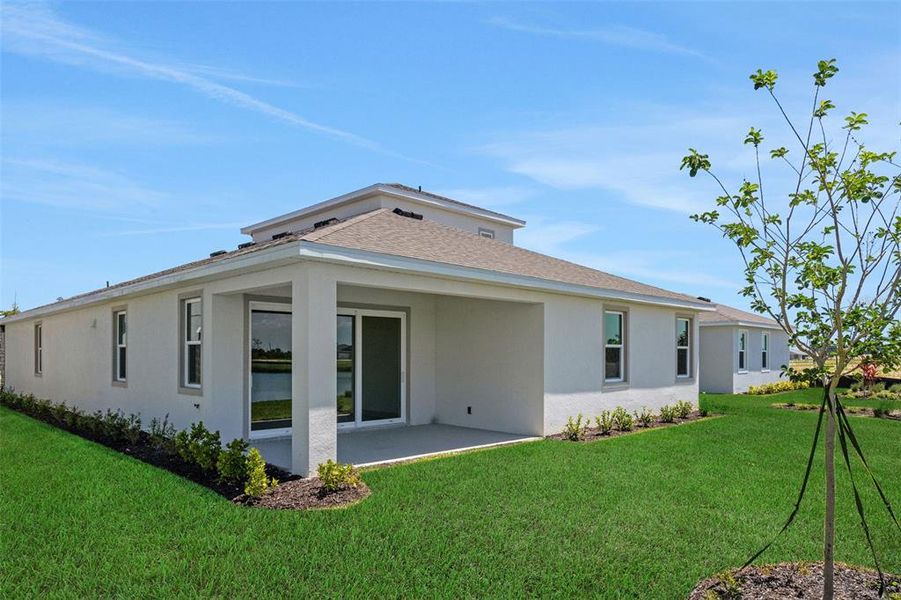Exterior details and patio area of a home in Creekside Run at Babcock Ranch, Punta Gorda (Image 3).