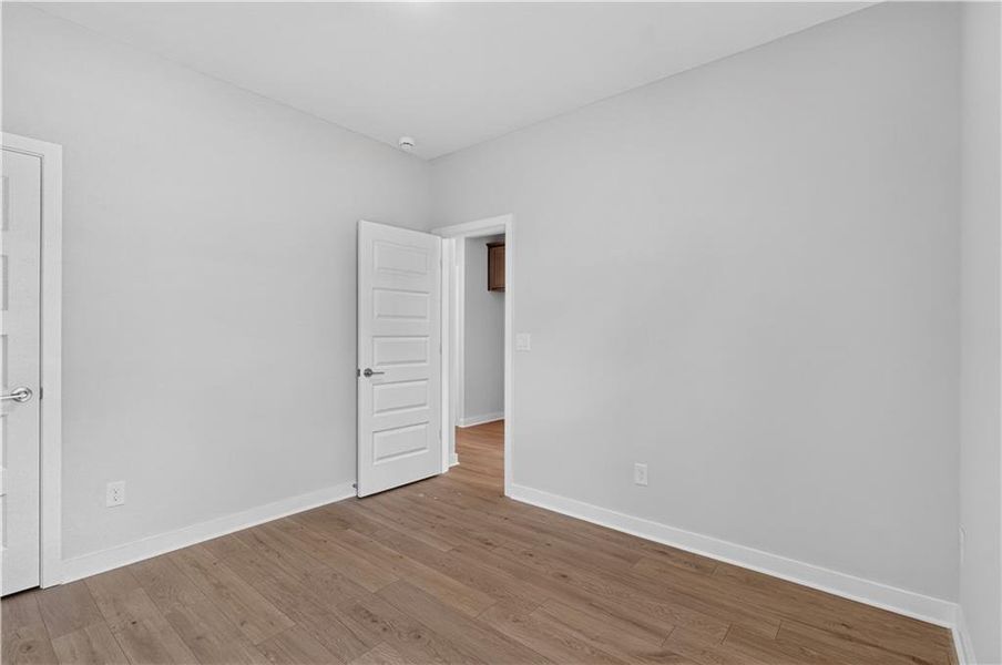 Spacious, unfurnished interior of a new home in The Cottages at East Lanier, Fayetteville (Image 15).