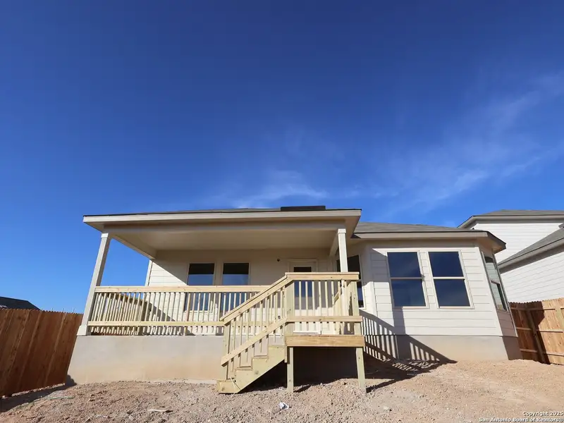 Exterior details and patio area of a home in Hunters Ranch, San Antonio (Image 3).