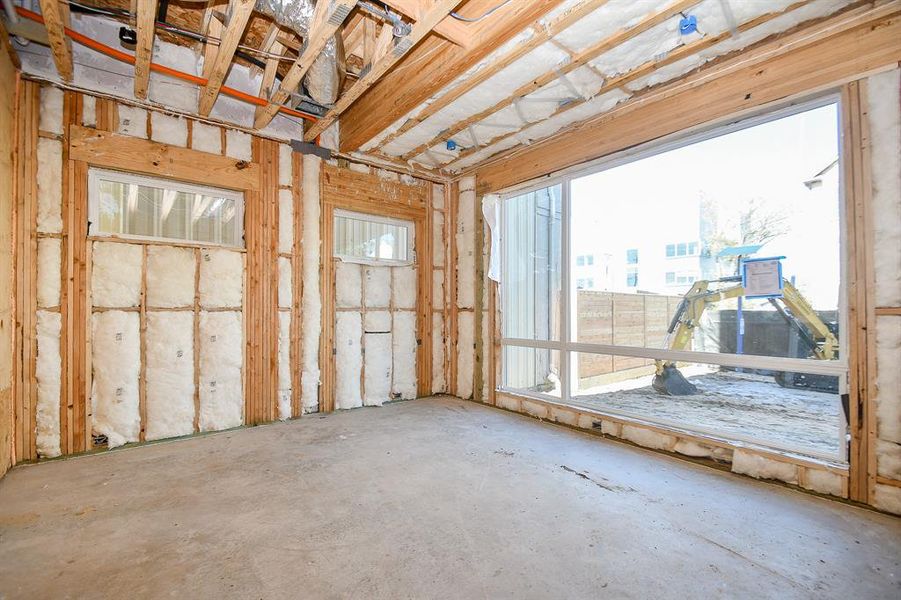 1st Floor Gameroom or Living Room. 24x48 tile to be installed. Large Architectural style Sierra Pacific windows installed.