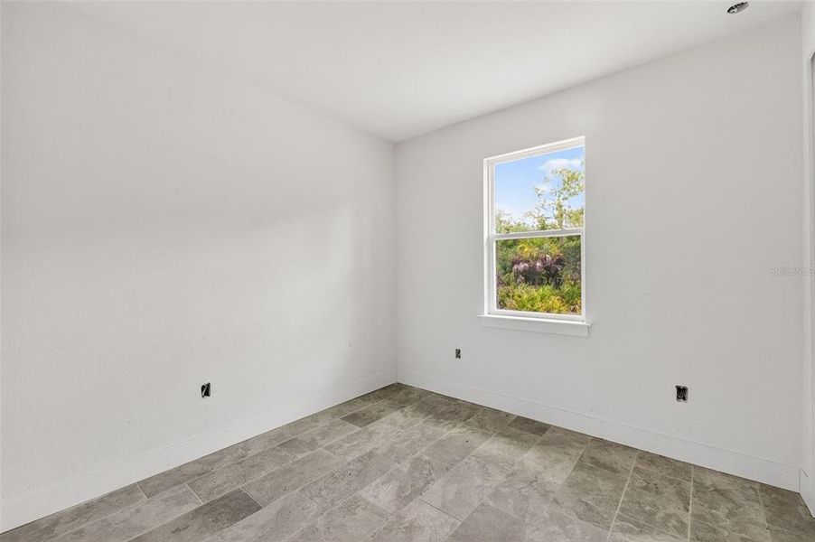 Spacious, unfurnished interior of a new home in , Port Charlotte (Image 9).