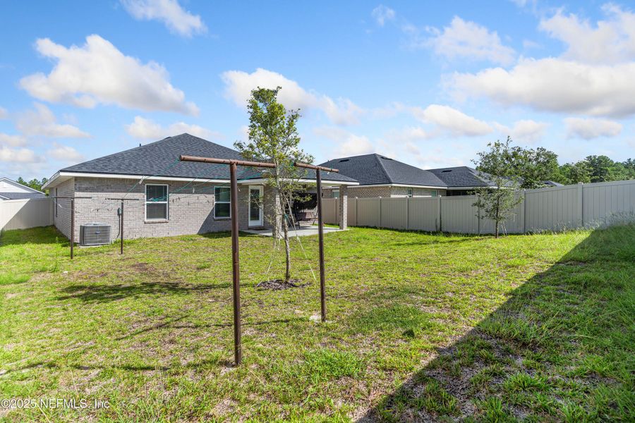 Front exterior of a new home in Shadow Crest at Rolling Hills, Green Cove Springs, FL, highlighting curb appeal (Image 2).
