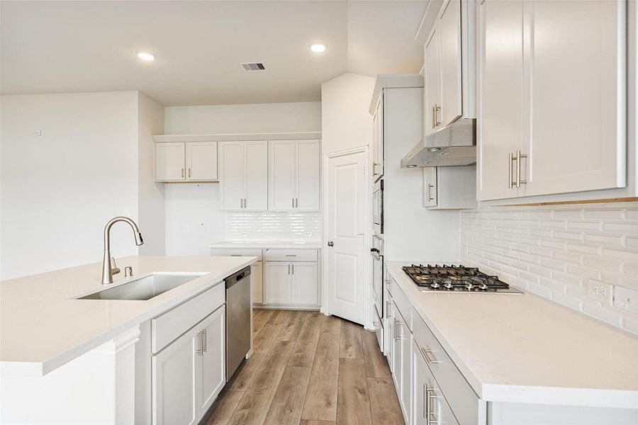 Furnished interior view inside a new home in Sunterra, Katy (Image 6). Furnished interior view inside a new home in Sunterra, Katy (Image 6).