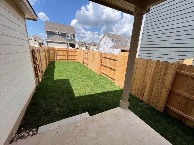 Front exterior of a new home in The Cottages at Lariat, Liberty Hill, TX, highlighting curb appeal (Image 13). Front exterior of a new home in The Cottages at Lariat, Liberty Hill, TX, highlighting curb appeal (Image 13).