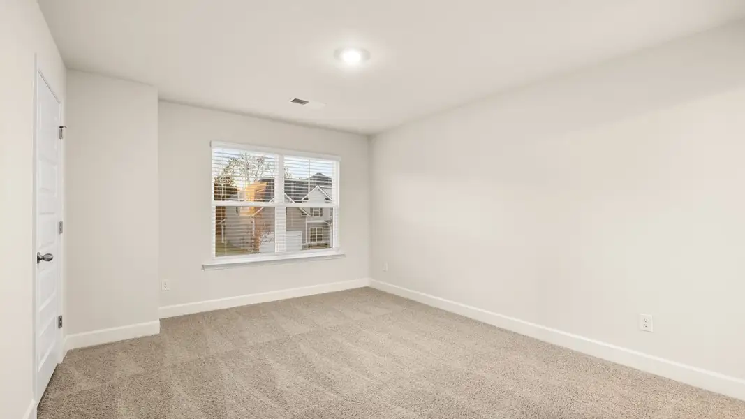 Representative unfurnished interior of a home built from the Jean Lee by D.R. Horton in Heritage Pointe, Senoia (Image 25).