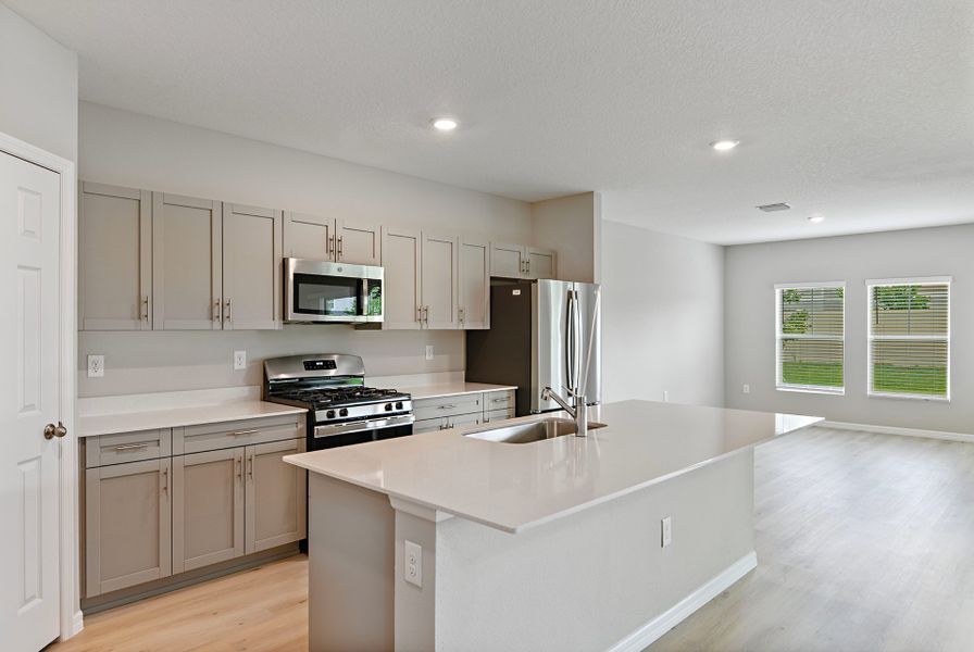 Furnished interior view inside a new home in Pasadena Ridge, Dade City (Image 3).