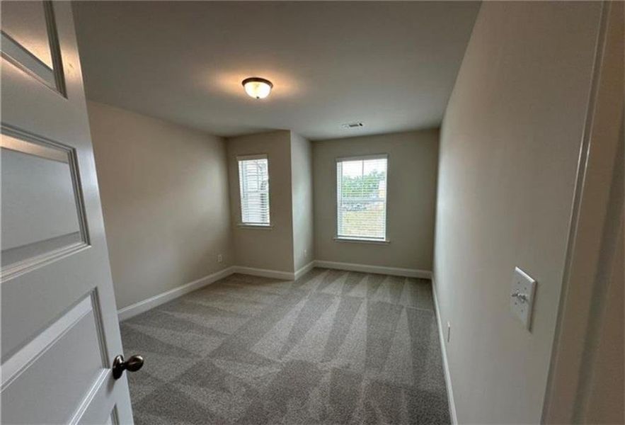 Spacious, unfurnished interior of a new home in Mulberry Summit, Flowery Branch (Image 13).