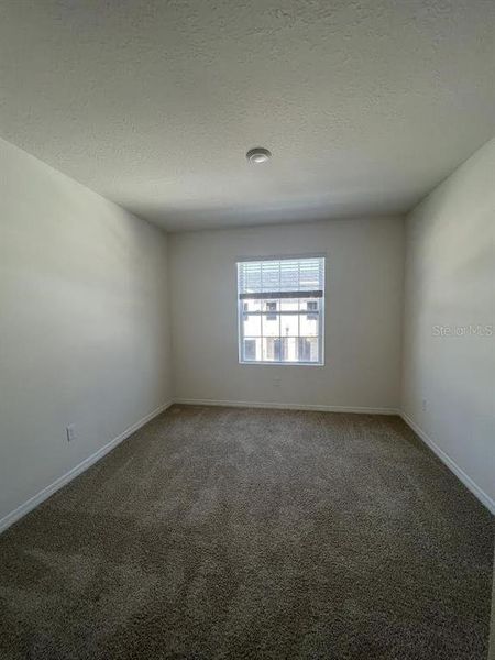 Spacious, unfurnished interior of a new home in Atria at Ridgewood Lakes, Davenport (Image 5).