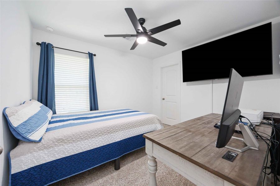 Secondary Bedroom Bright and versatile with ceiling fan, window for natural light. Secondary Bedroom Bright and versatile with ceiling fan, window for natural light.