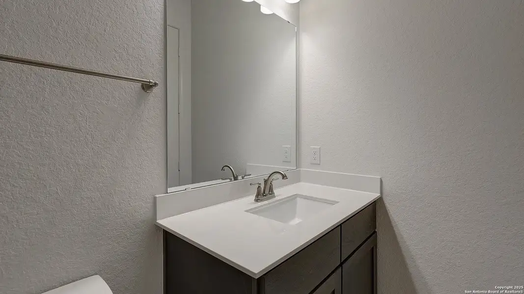 Furnished interior view inside a new home in Kallison Ranch 60', San Antonio (Image 5).