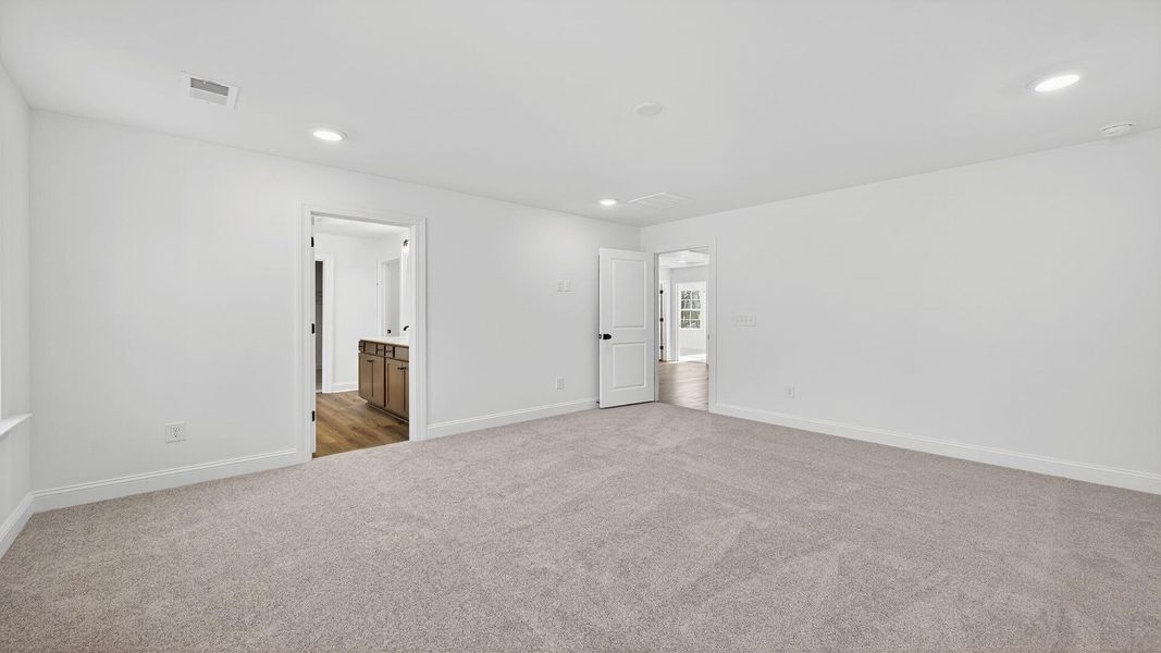 Spacious, unfurnished interior of a new home in Creekside at Andrews, Summerville (Image 21).