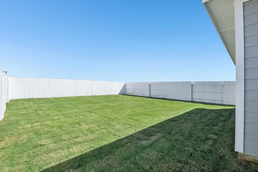 Exterior details and patio area of a home in Harvest Ridge, Elgin (Image 18).