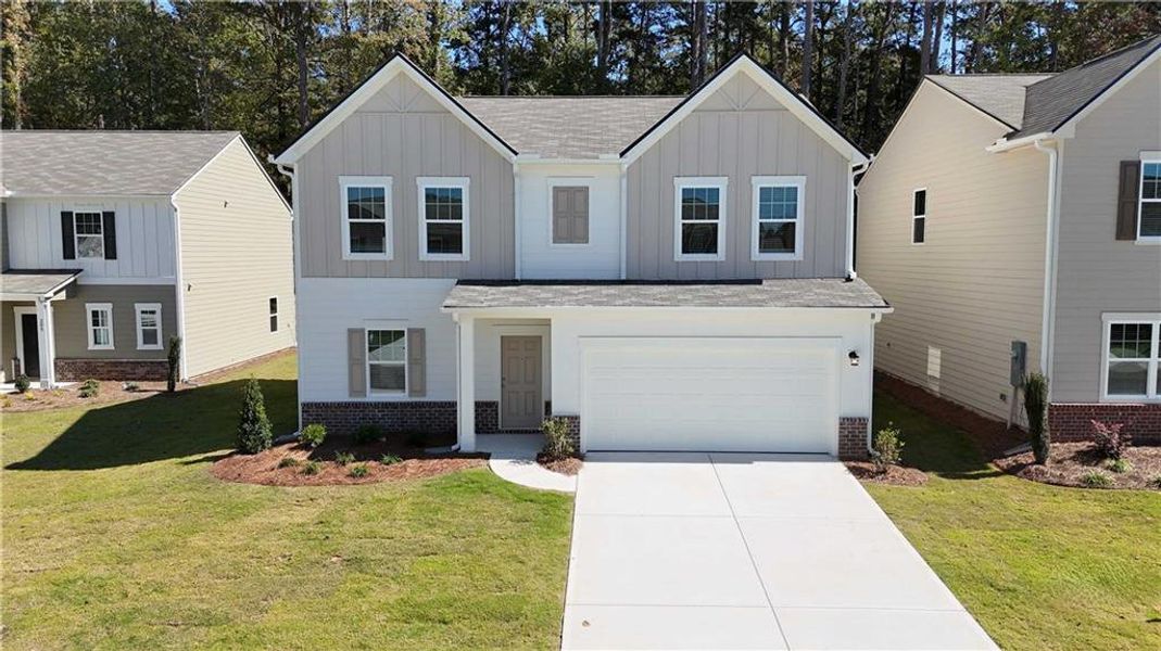 Front exterior of a new home in Casteel, Bethlehem, GA, highlighting curb appeal (Image 1).