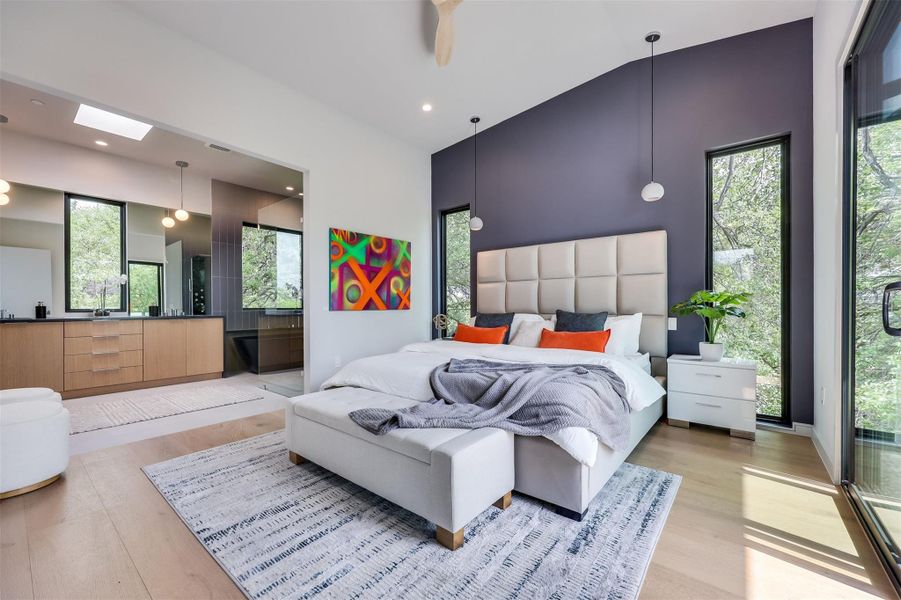 The entire third floor is your domain, topped with 10-foot vaulted ceilings that make the suite feel like a true sanctuary above the city