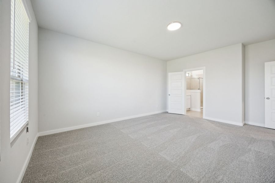 Primary Suite in the Masters home plan by Trophy Signature Homes – REPRESENTATIVE PHOTO Primary Suite in the Masters home plan by Trophy Signature Homes – REPRESENTATIVE PHOTO