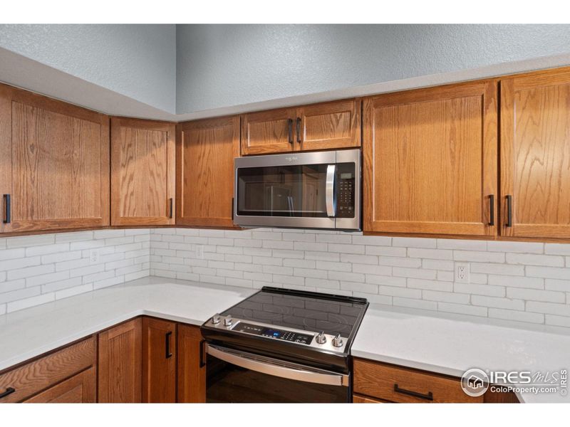 Quartz countertops and soft close cabinetry throughout