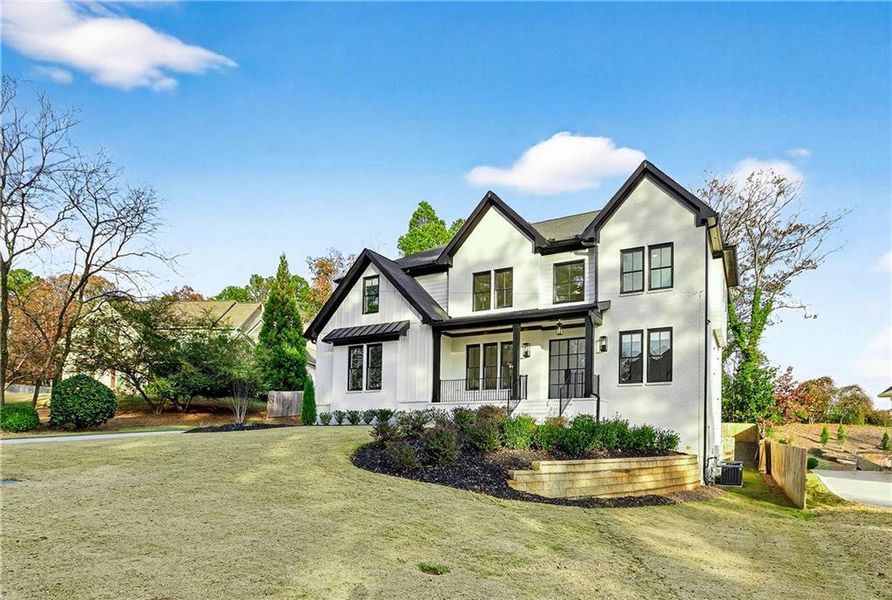 Front exterior of a new home in , Marietta, GA, highlighting curb appeal (Image 37).