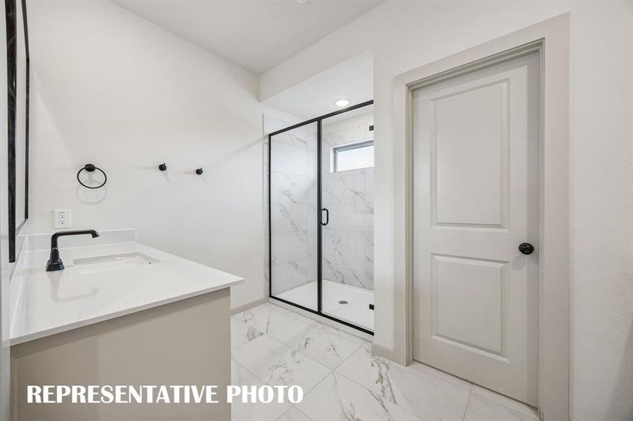 You'll enjoy the oversized walk in shower in this owner's bath.  REPRESENTATIVE PHOTO