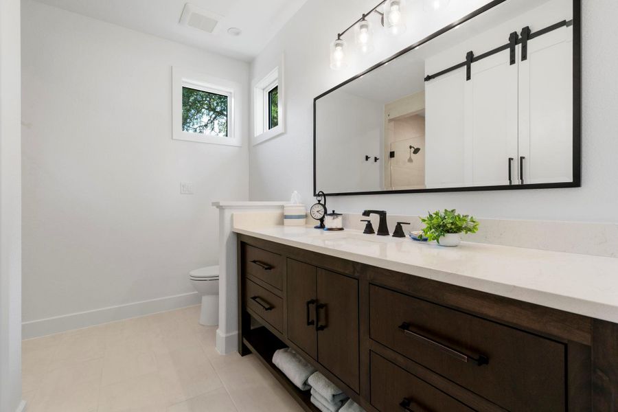 Bedroom # 2 ensuite bath with walk-in shower and large closet. Bedroom # 2 ensuite bath with walk-in shower and large closet.