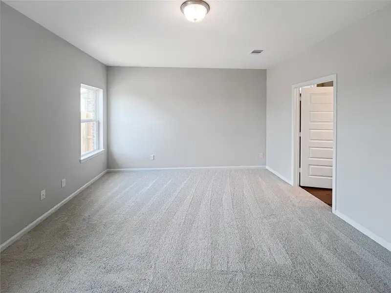 The Caldwell- Primary Bedroom Suite. Sample image for illustration; upgrades, options, and colors may vary.