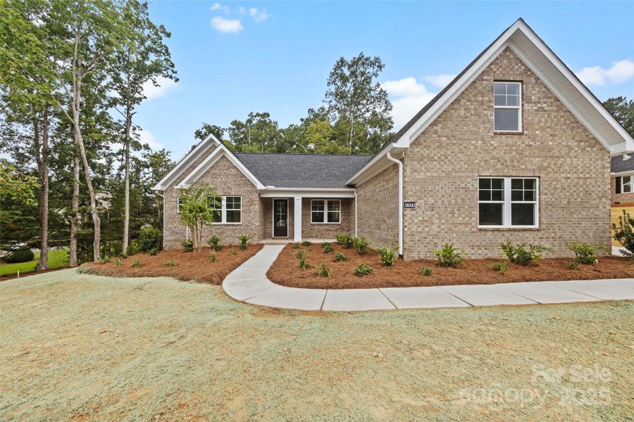 Front exterior of a new home in , Lancaster, SC, highlighting curb appeal (Image 20).