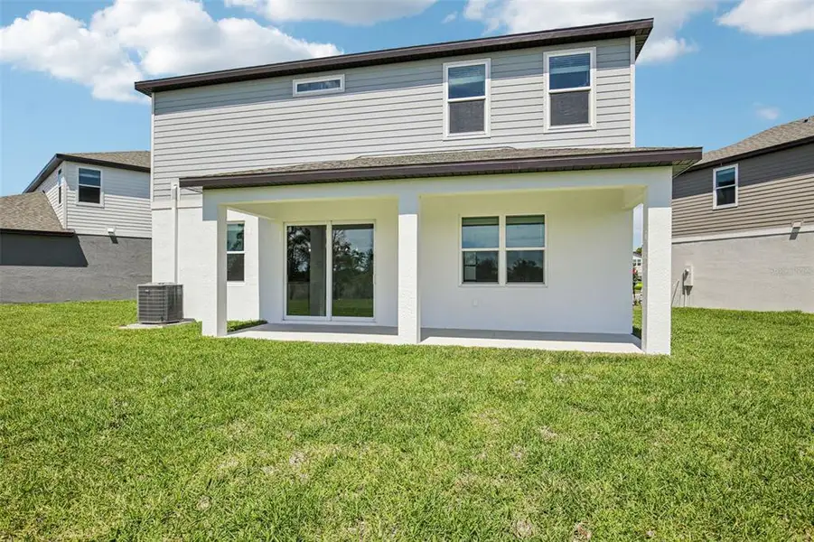 Exterior details and patio area of a home in Magnolia Bay - Reserve Series, Nokomis (Image 3).