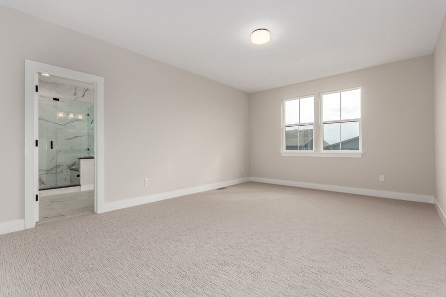 Spacious, unfurnished interior of a new home in West Grange, Longmont (Image 37).