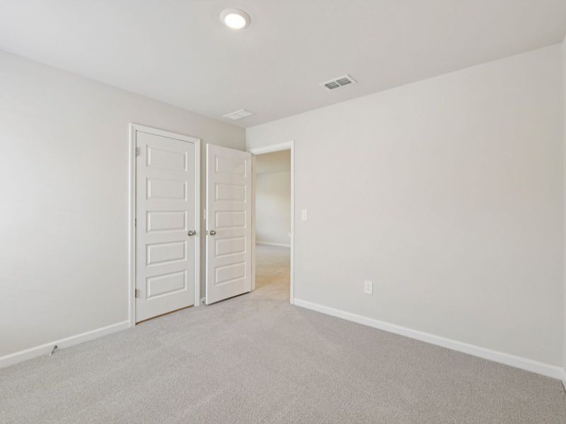 Spacious, unfurnished interior of a new home in Vines at Mill Creek - Estate Series, Braselton (Image 21).