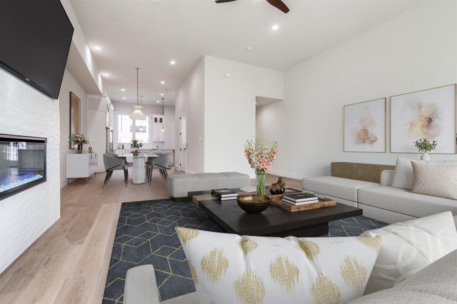 virtually staged living looking towards dining and kitchen