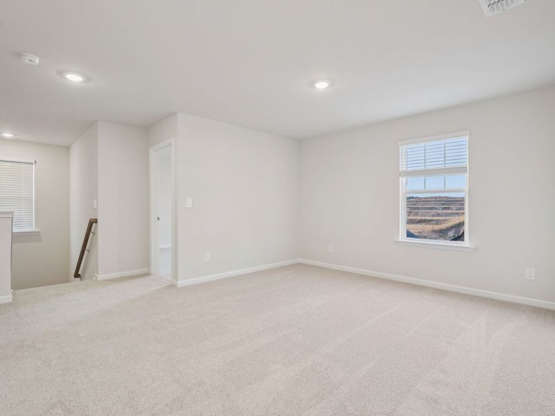 Spacious, unfurnished interior of a new home in Vines at Mill Creek - Estate Series, Braselton (Image 16).
