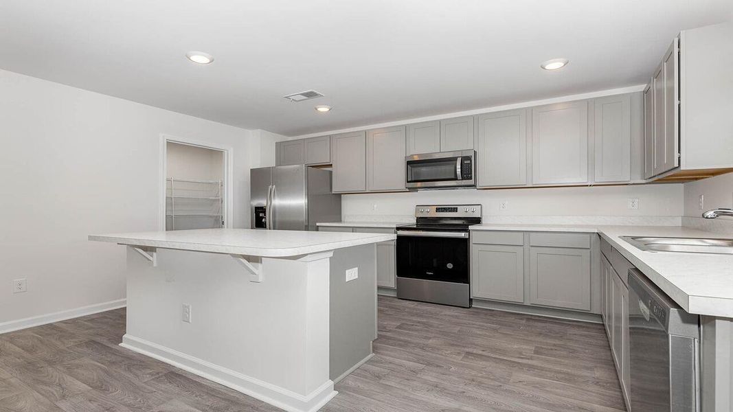 Furnished interior view inside a new home in The Ranch, Holly Hill (Image 2).