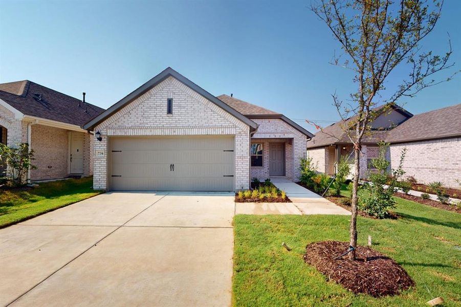 Front exterior of a new home in Elevon, Lavon, TX, highlighting curb appeal (Image 1). Front exterior of a new home in Elevon, Lavon, TX, highlighting curb appeal (Image 1).